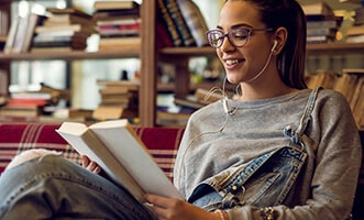 Woman reading at book store